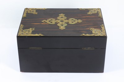 Lot 513 - A mid Victorian Coromandel Sewing Box