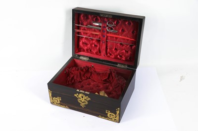 Lot 513 - A mid Victorian Coromandel Sewing Box