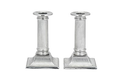 Lot 358 - A pair of Victorian sterling silver desk or dwarf candlesticks, Sheffield 1889 by Fenton Brothers