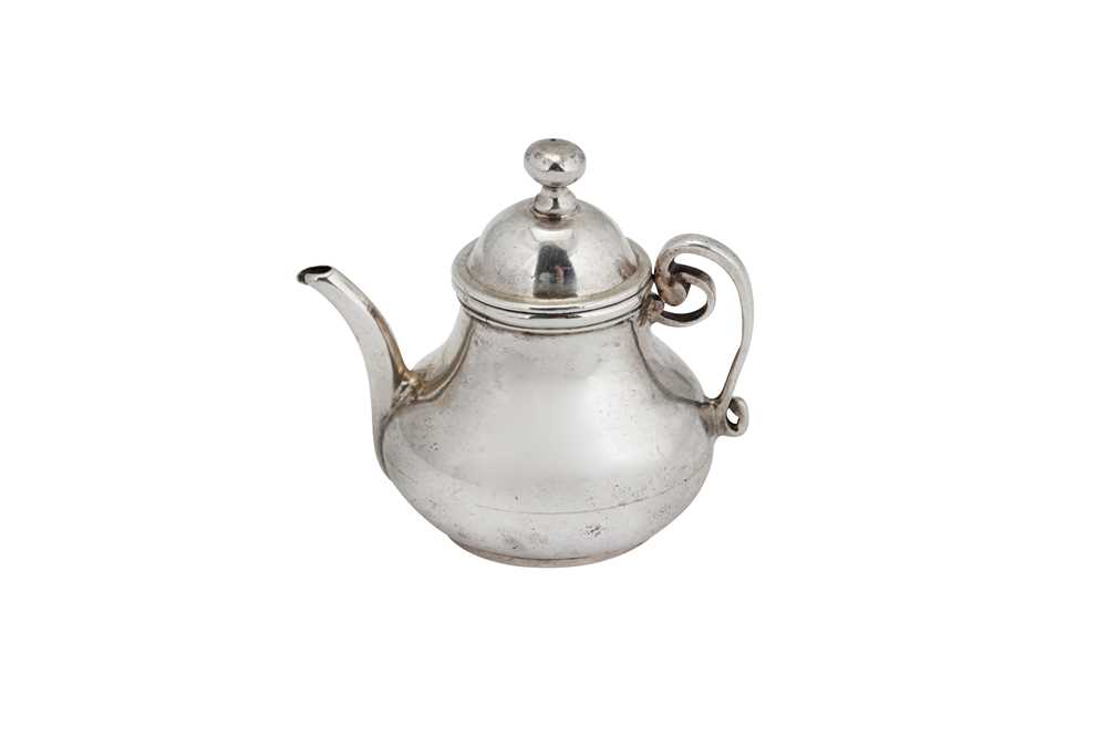 Lot 1 - An early 18th century Dutch silver miniature ‘toy’ teapot, Amsterdam 1738 by Willem van Strant (active 1727-1742)