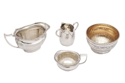 Lot 14 - A mixed group of sterling silver milk jugs and a sugar bowl