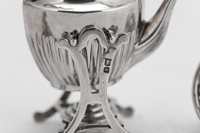 Lot 4 - An Edwardian sterling silver miniature toy tipping kettle on burner stand, Chester 1907 by Saunders and Shepard
