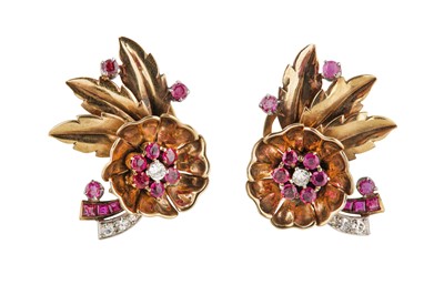 Lot 185 - A pair of ruby and diamond earclips, circa 1945