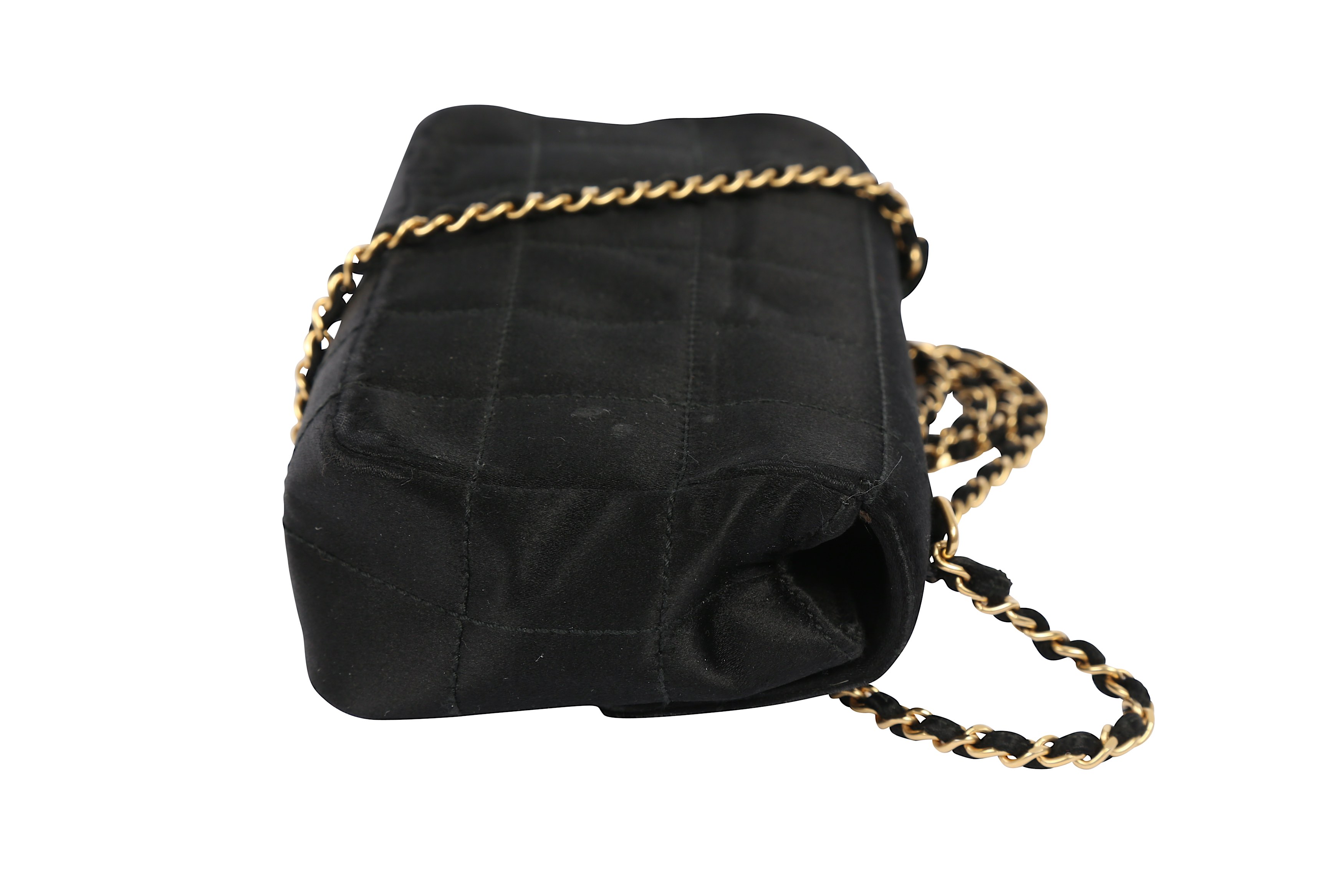 Sold at Auction: A Chanel quilted black satin evening bag, 2000-2002