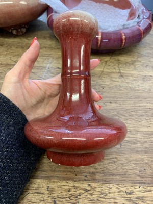 Lot 118 - A CHINESE COPPER RED-GLAZED GARLIC NECKED VASE.