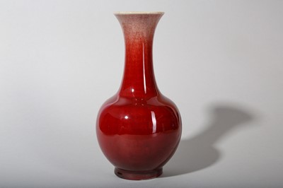 Lot 123 - A CHINESE COPPER RED-GLAZED BOTTLE VASE.