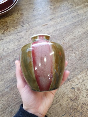 Lot 124 - A CHINESE COPPER RED AND OLIVE GREEN-GLAZED JAR.