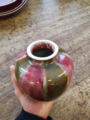 Lot 124 - A CHINESE COPPER RED AND OLIVE GREEN-GLAZED JAR.