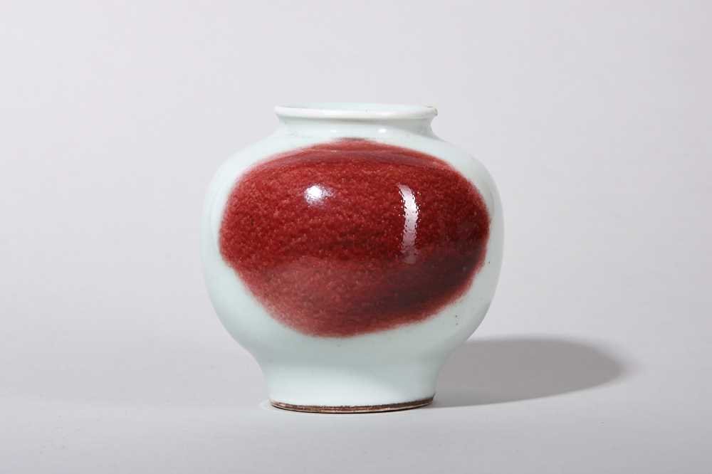 Lot 126 - A CHINESE COPPER-RED SPLASHED VASE.