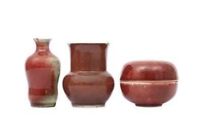 Lot 42 - THREE CHINESE COPPER RED-GLAZED SCHOLAR'S DESK ITEMS.
