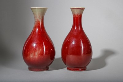 Lot 131 - A PAIR OF CHINESE COPPER RED-GLAZED VASES.