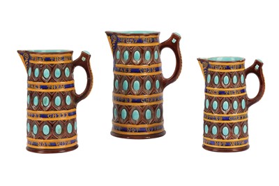 Lot 234 - A set of three Wedgwood Majolica jugs