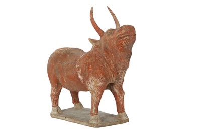 Lot 659 - A CHINESE POTTERY MODEL OF A BULL.
