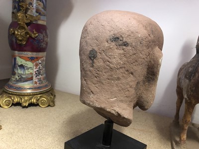 Lot 1110 - A CHINESE STONE HEAD OF AN ARHAT.