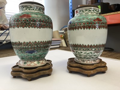 Lot 259 - A PAIR OF CHINESE FAMILLE VERTE JARS.
