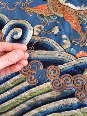 Lot 376 - A CHINESE BLUE-GROUND DRAGON ROBE FRAGMENT.
