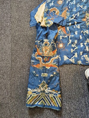Lot 376 - A CHINESE BLUE-GROUND DRAGON ROBE FRAGMENT.