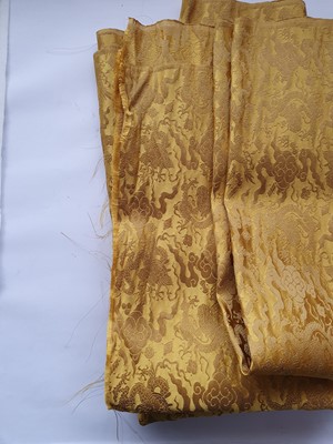 Lot 140 - A LARGE CHINESE IMPERIAL YELLOW SILK DAMASK 'DRAGON' PANEL.