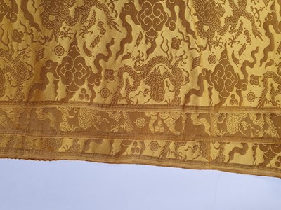 Lot 140 - A LARGE CHINESE IMPERIAL YELLOW SILK DAMASK 'DRAGON' PANEL.