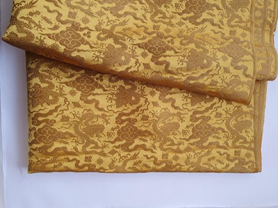 Lot 140 - A LARGE CHINESE IMPERIAL YELLOW SILK DAMASK 'DRAGON' PANEL.