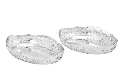 Lot 324 - A pair of Edwardian sterling silver nut dishes, Birmingham 1932 by J. W. Tiptaft & Son Ltd (reg. Oct 1914)