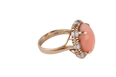 Lot 129 - A coral and diamond ring