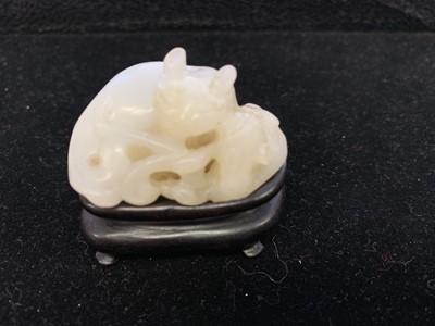 Lot 89 - A CHINESE WHITE JADE 'CAT' GROUP.