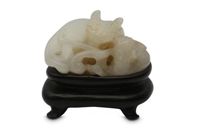 Lot 127 - A CHINESE WHITE JADE 'CAT' GROUP.