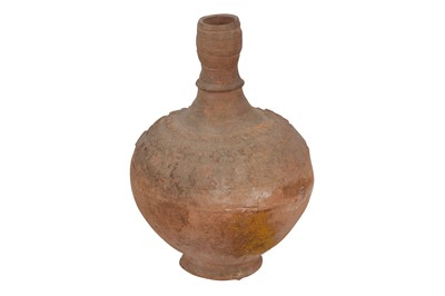 Lot 445 - An unglazed moulded earthenware vase