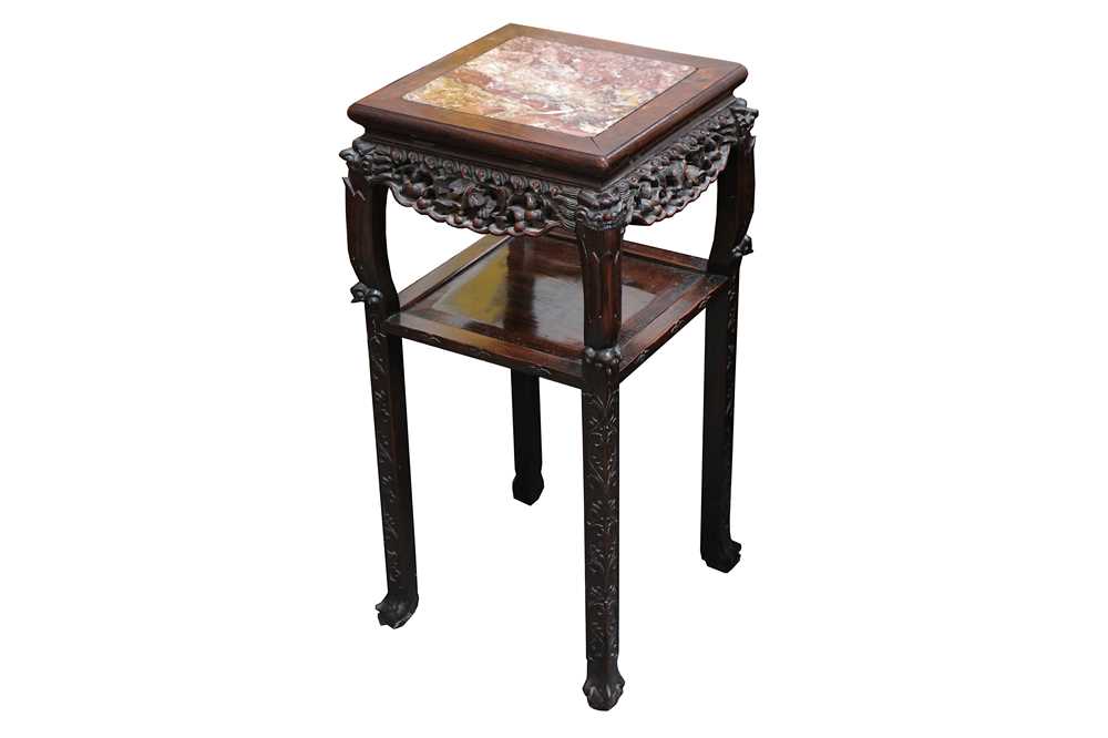 Lot 601 - A 19th Century Chinese carved hardwood jardiniere stand