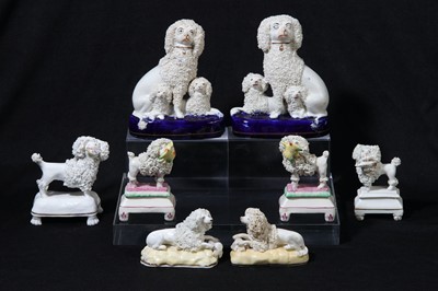 Lot 191 - A pair of Staffordshire poodles, by William Kent, circa mid 1825-50