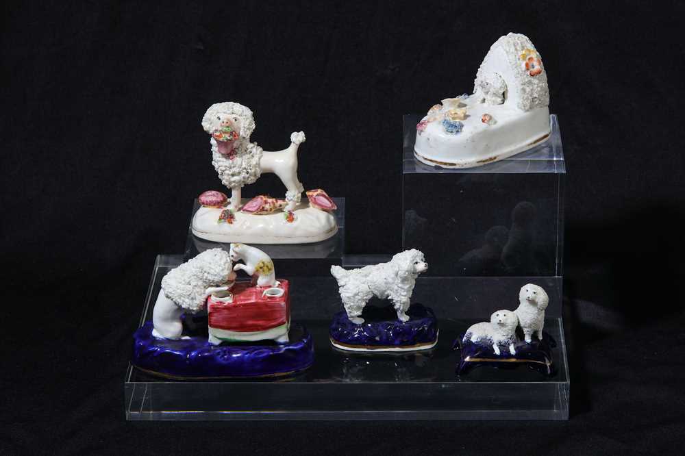 Lot 194 - A Staffordshire porcelain poodle group, possibly Dudson, circa 1840-50