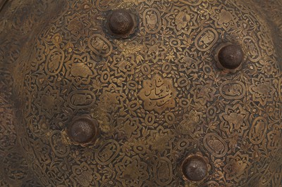 Lot 401 - A QAJAR GILT-COPPER SHIELD