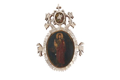Lot 194 - λ A MOTHER-OF-PEARL-INLAID OVAL FRAME WITH CHRISTIAN ICON