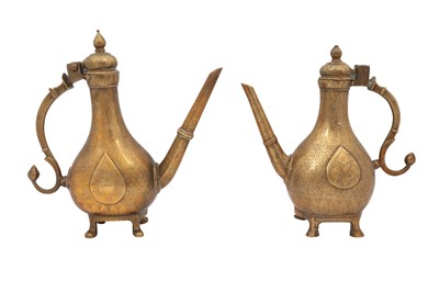 Lot 299 - A Near Pair of Engraved Miniature Brass Ewers (Aftabeh)
