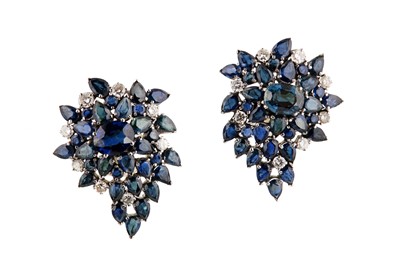 Lot 145 - A pair of sapphire and diamond earrings