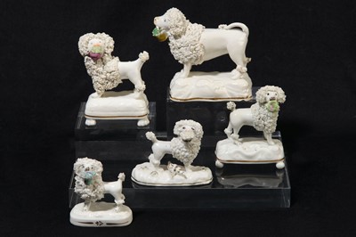 Lot 201 - A collection of Staffordshire porcelain poodles, circa 1835-50