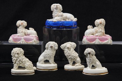Lot 202 - A pair of Staffordshire porcelain poodles, circa 1820-50