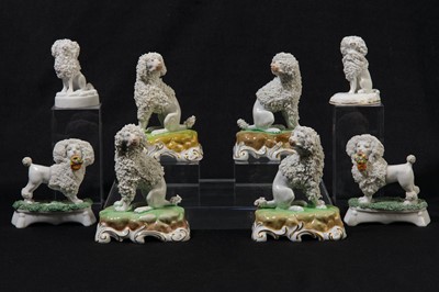 Lot 208 - Four pairs of early 20th century Dresden models of poodles