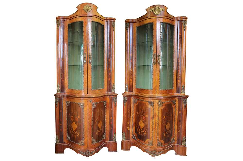 Lot 673 - A pair of early to mid 20th Century French rosewood corner display cabinets