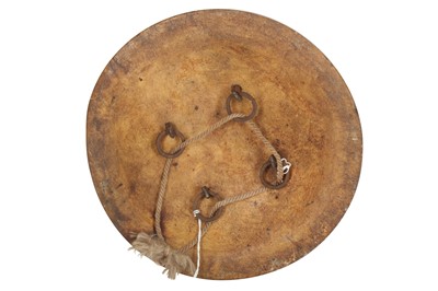 Lot 301 - A Wood and Dried Leather Ceremonial Shield