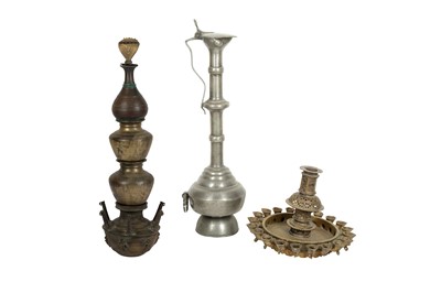 Lot 308 - Two Copper-Alloy Oil Lamps and a Monumental High-Neck Tinned Ewer