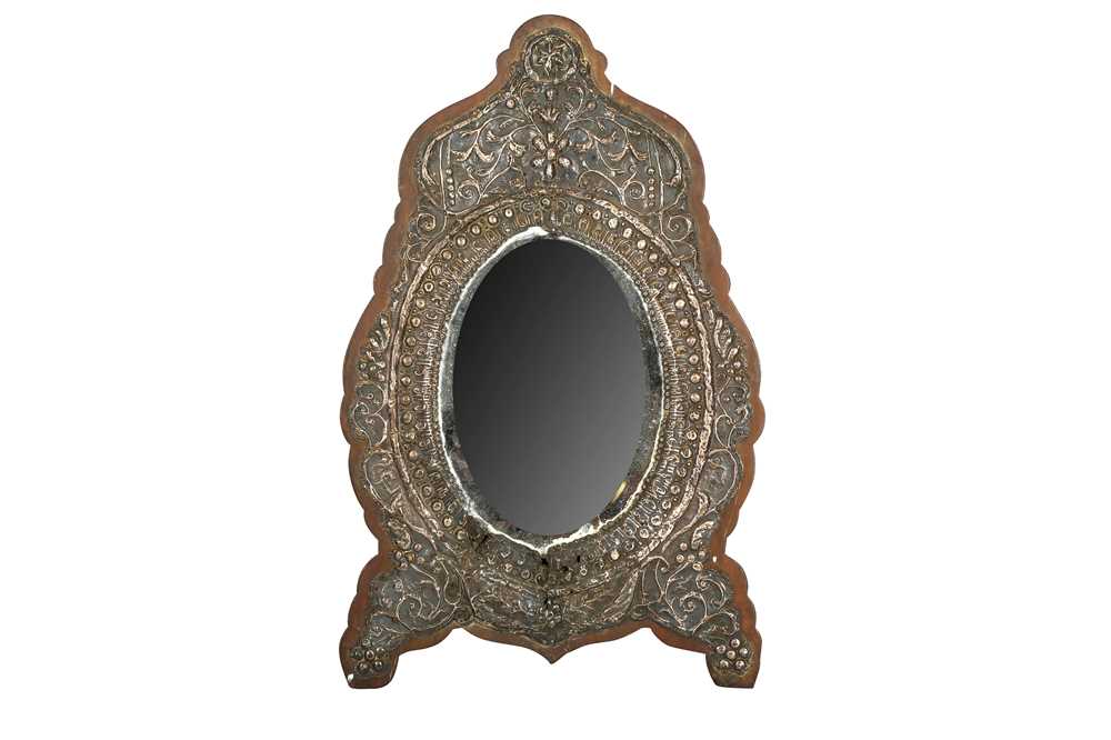 Lot 318 - A Silver Repoussé Framed Ottoman Mirror