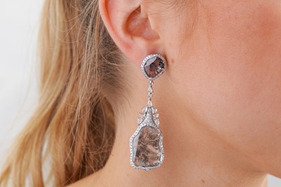 Lot 34 - A pair of diamond pendent earrings