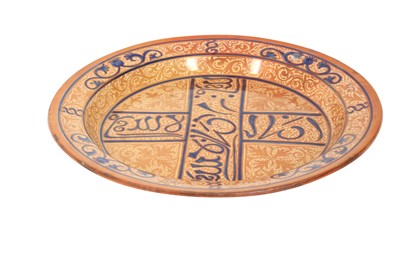Lot 804 - A LARGE HISPANO-MORESQUE COPPER LUSTRE POTTERY DISH WITH PSEUDO-CALLIGRAPHY