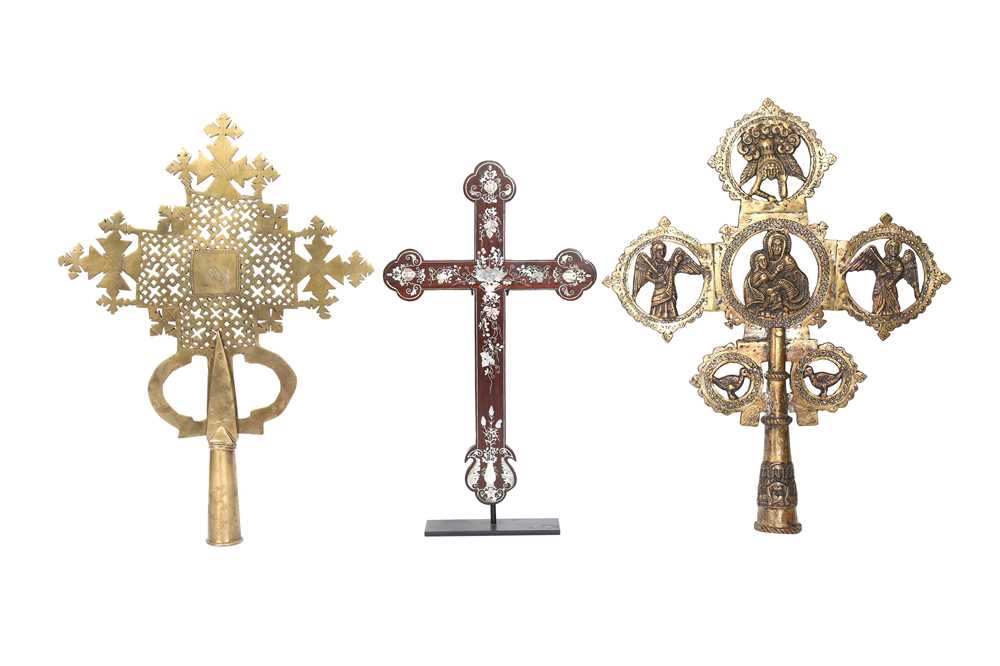 Lot 895 - λ TWO ETHIOPIAN BRASS COPTIC CROSSES PATONCE AND A CHINESE MOTHER-OF-PEARL-INLAID ROSEWOOD CRUCIFIX