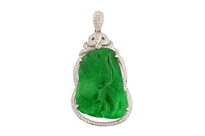 Lot 235 - A jade and diamond pendant