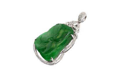 Lot 235 - A jade and diamond pendant