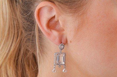 Lot 11 - A pair of diamond and white topaz earrings