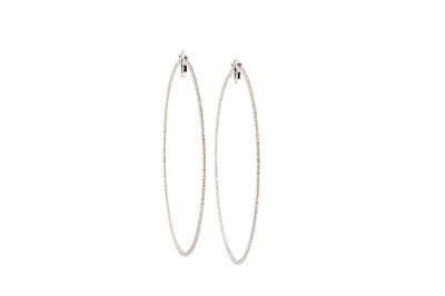 Lot 231 - A pair of diamond hoop earrings